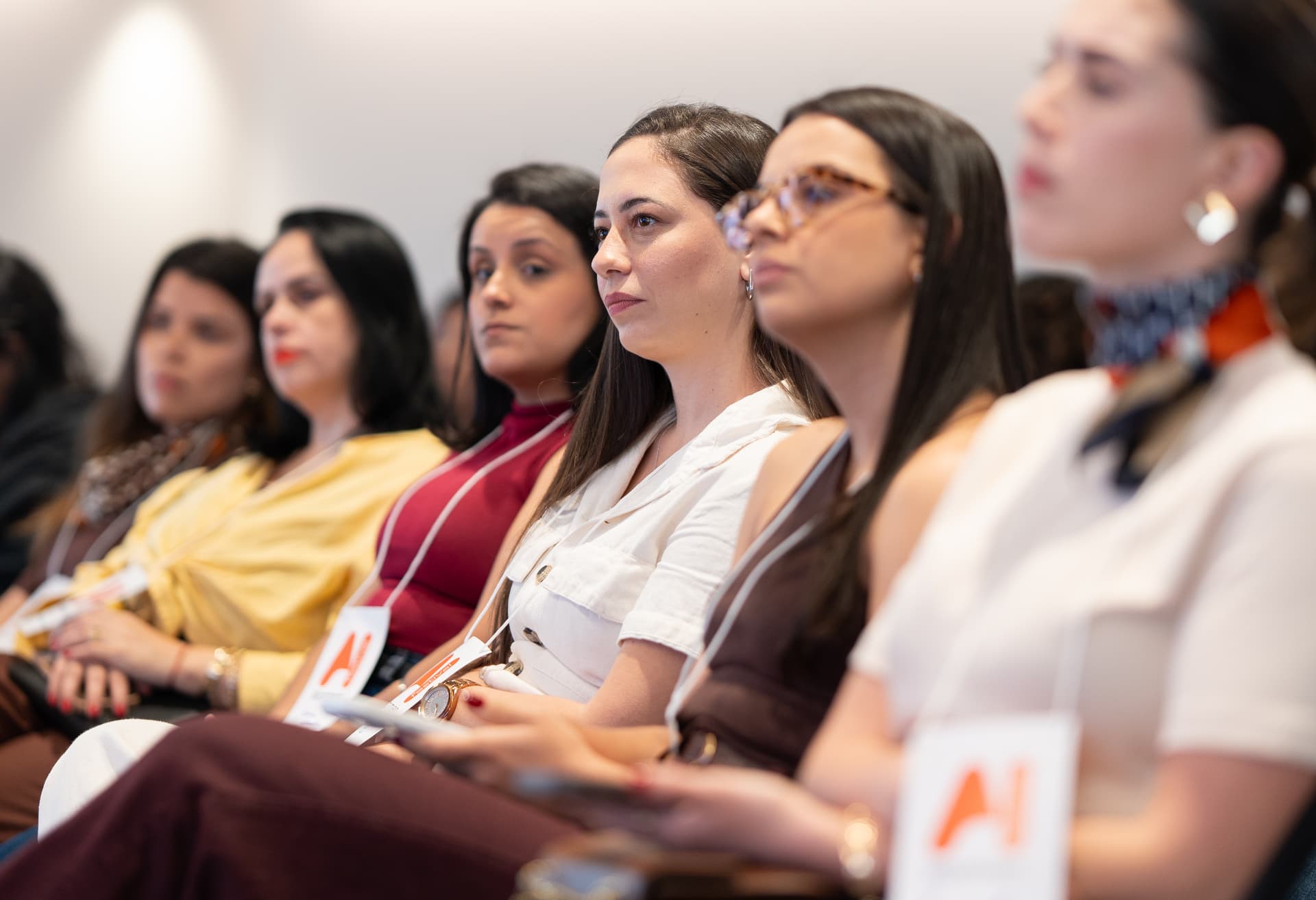 Foto — Participantes na plateia do AI Festival Women